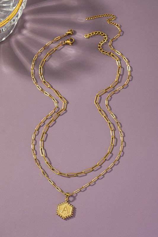 Layered necklace with letter pendant
