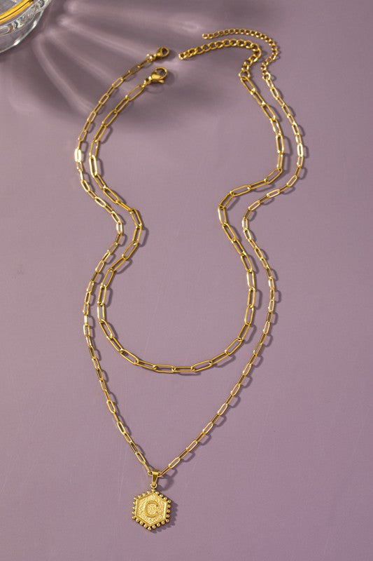 Layered necklace with letter pendant