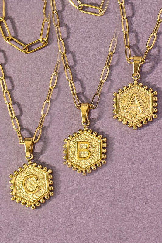 Layered necklace with letter pendant