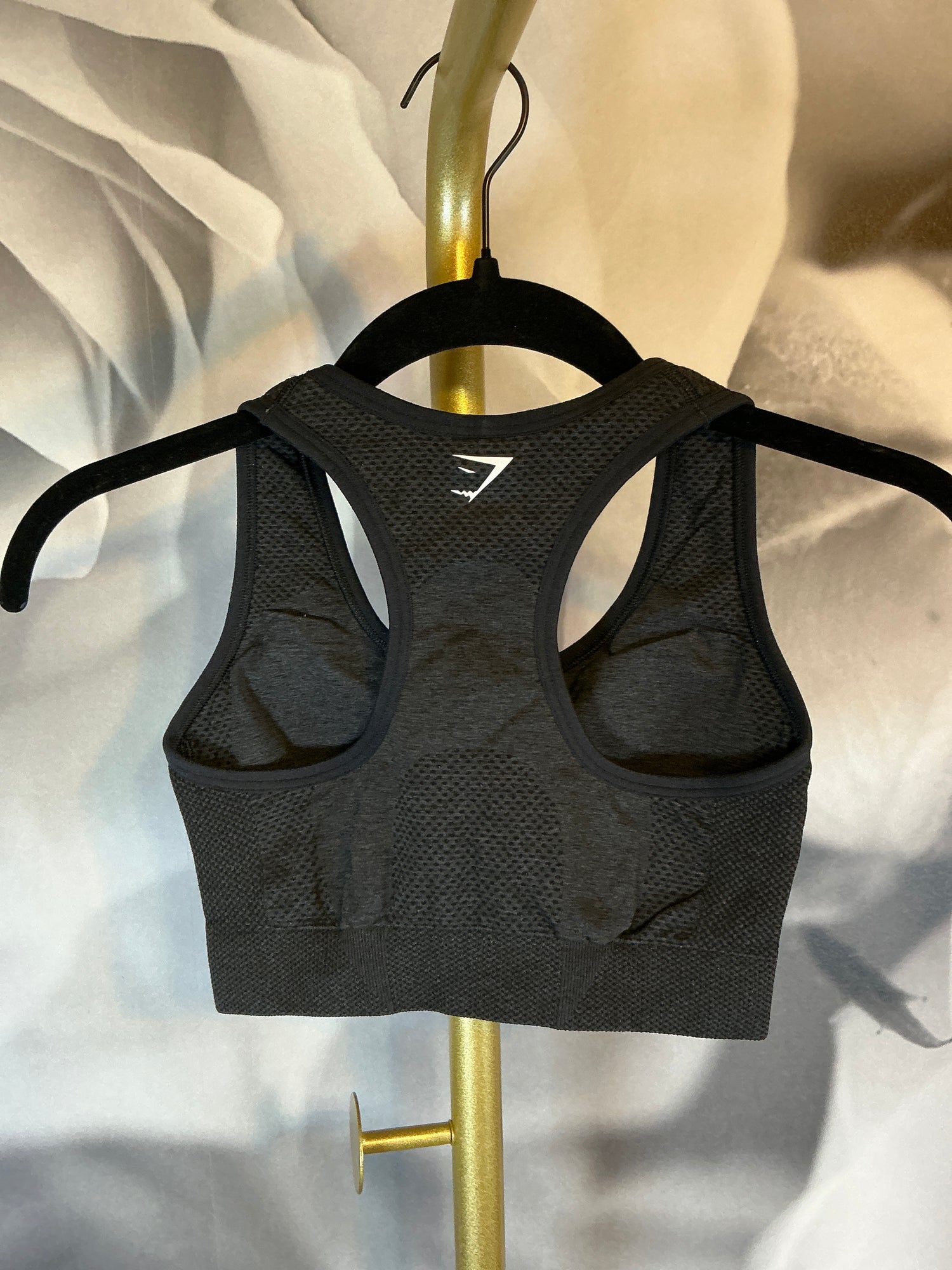 Gymshark black padded sports bra in size XS – breathable and supportive – Ivy & Lane