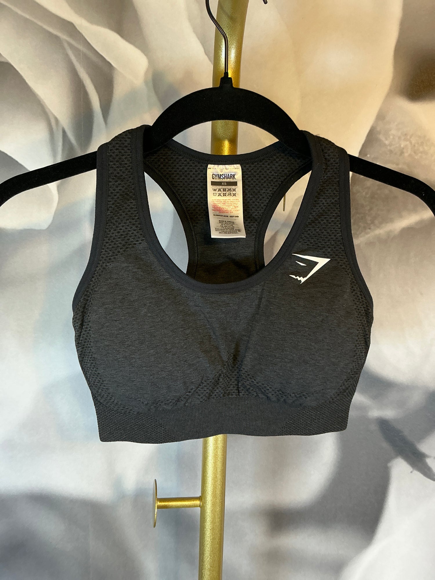 Gymshark black padded sports bra in size XS – breathable and supportive – Ivy & Lane