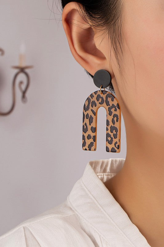 Embossed animal print arch drop earrings - Ivy & Lane