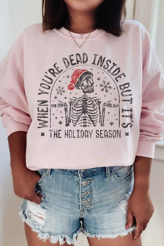 Christmas Skeleton Graphic Sweatshirt - Ivy & Lane