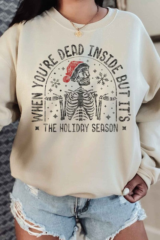 Christmas Skeleton Graphic Sweatshirt - Ivy & Lane