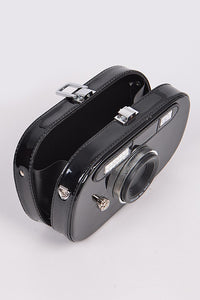 Metallic Oval Camera Iconic Swing Clutch Bag