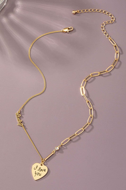 Asymmetric delicate necklace with heart pendant